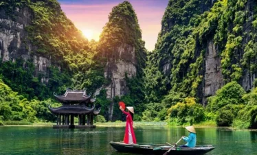 Trang An is a scenic area near Ninh Binh, Vietnam renowned for its boat cave tours.